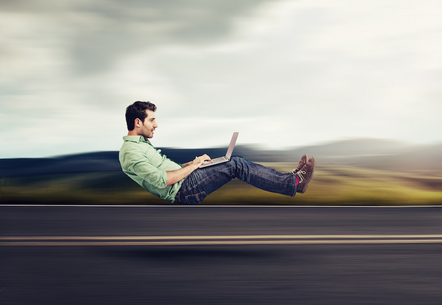 man on laptop using very fast broadband