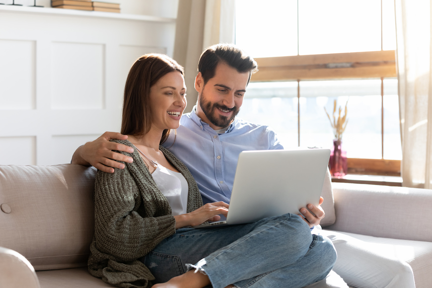 young couple with laptop