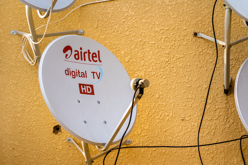 Airtel DTH antenna on a wall