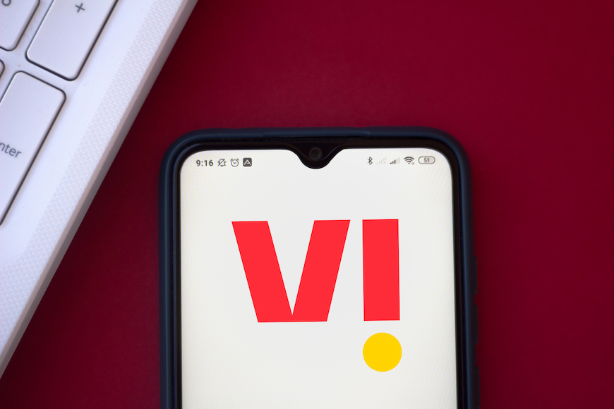 Vi logo on a phone screen